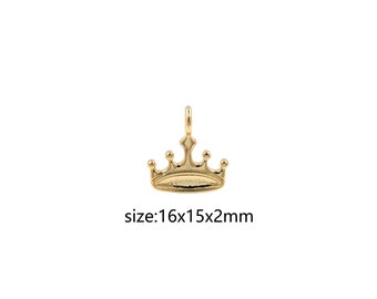 Op de afbeelding: Goudkleurige metalen kroonbedel met een gladde, ovale basis. De bedel meet 16x15x2mm.