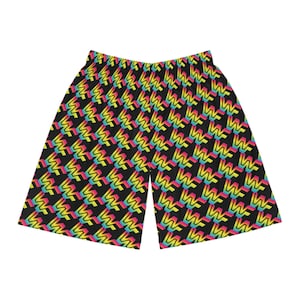 May include: Black shorts with a repeating pattern of colorful, stylized letter "W" shapes in yellow, pink, blue, and green. The shorts have an elastic waistband and a relaxed fit, suitable for casual wear.