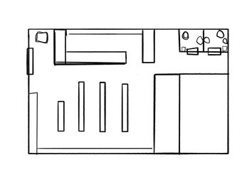 May include: Black and white line drawing of a floor plan for a building with multiple rooms. The plan shows a large open space with several smaller rooms off to the side.