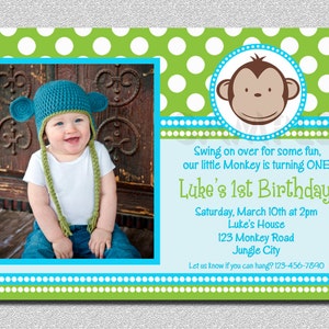 May include: A green and blue polka dot birthday invitation with a photo of a baby wearing a blue crocheted hat. The invitation says "Swing on over for some fun, our little Monkey is turning ONE! Luke's 1st Birthday! Saturday, March 10th at 2pm Luke's House 123 Monkey Road Jungle City Let us know if you can hang? 123-456-7890"