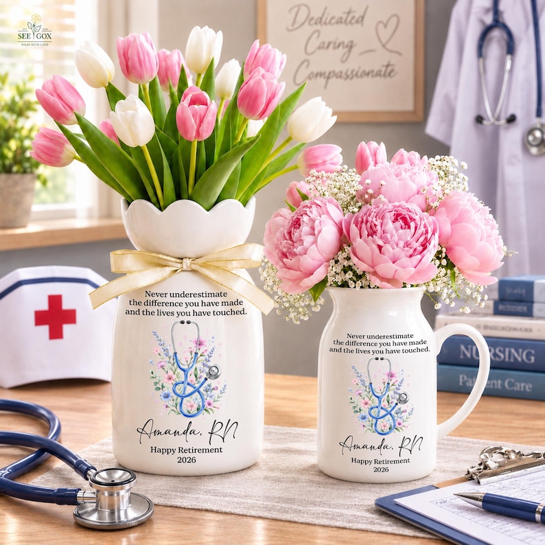May include: A white ceramic vase and a white ceramic mug, both featuring a floral design with a blue stethoscope, the text "Never underestimate the difference you have made and the lives you have touched," "Amanda, RN," and "Happy Retirement 2026."