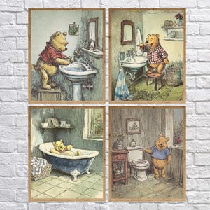 May include: A set of four framed prints depicting Winnie the Pooh in bathroom settings. The illustrations show Pooh washing his hands, brushing his teeth, relaxing in a bathtub, and standing by a toilet, all in a charming, vintage style.