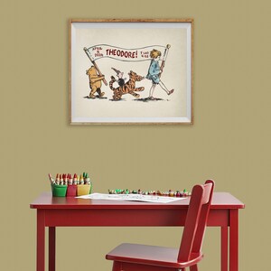 May include: A framed illustration featuring Winnie the Pooh, Tigger, and Christopher Robin. The banner reads "THEODORE!" with the date "APRIL 8 2024" and the weight "7 lbs 4 oz". The artwork is displayed above a red table with art supplies.