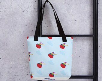 May include: A light blue tote bag with a repeating pattern of a cartoon character on a red ball. The character wears a purple hat and has a long yellow nose. The bag has black handles and the text "DRAWFORTH" at the bottom.