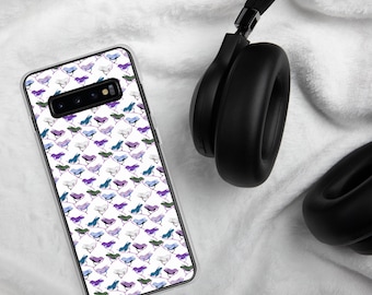 May include: A clear phone case with a repeating pattern of small, stylized birds in shades of purple, blue, green, and gray on a white background. Black over-ear headphones are placed next to the phone case on a white, textured surface.