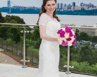 Modest Wedding Dress with Sleeves and Hand Beaded French Lace by Award Winning Bridal Salon in New Jersey