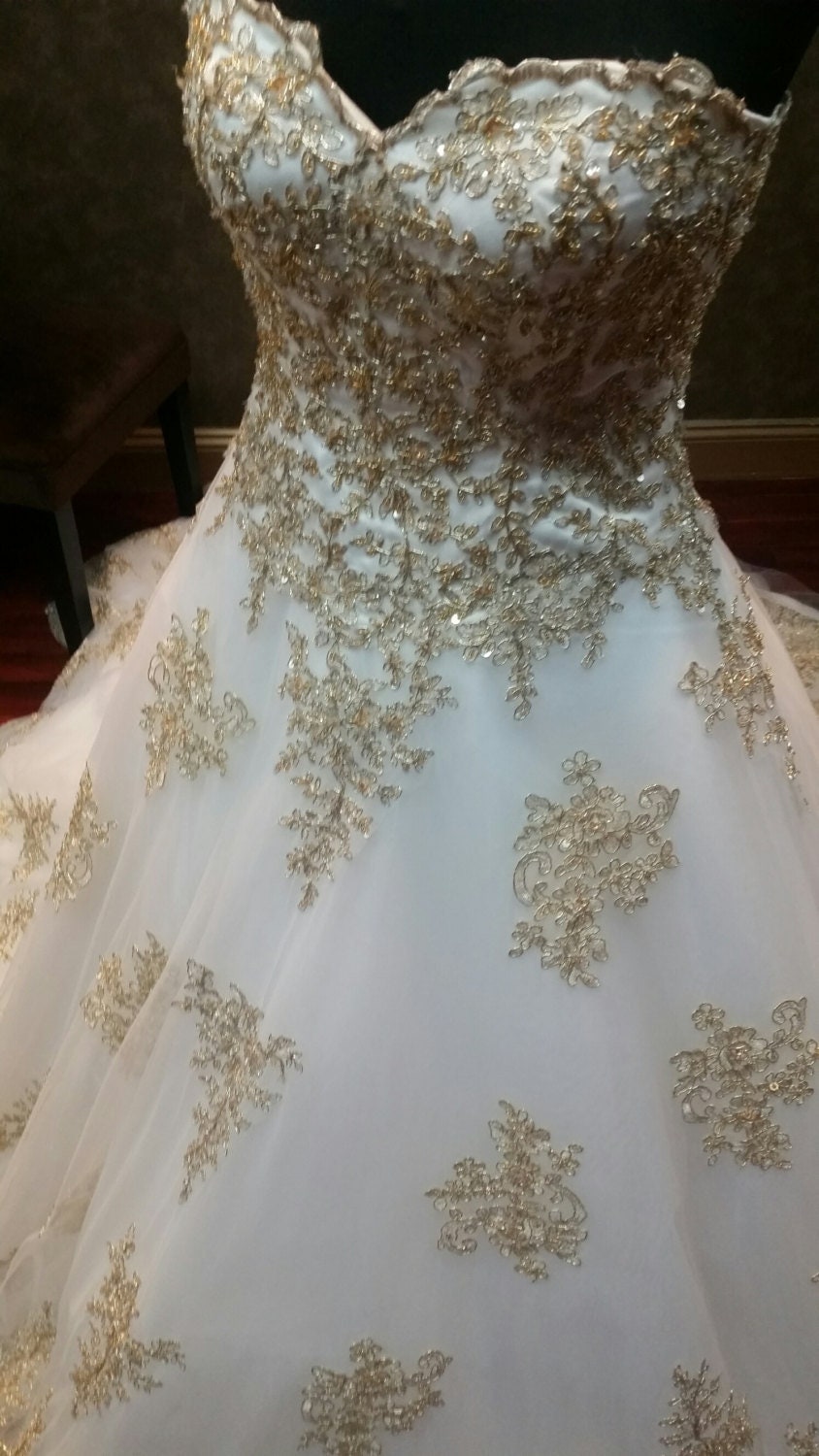 white and gold wedding dress