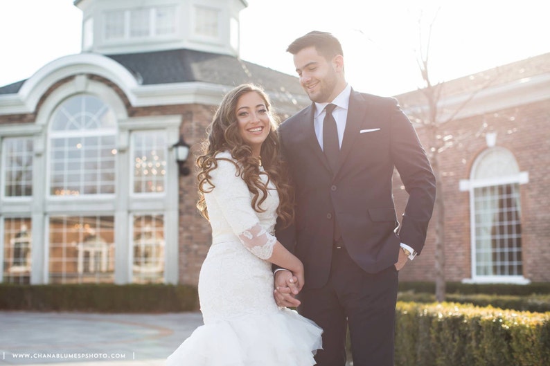 Stunning Modest Wedding Dress with Long Sleeves French Lace and Wave Organza by Award Winning Bridal Salon in Teaneck, NJ image 4