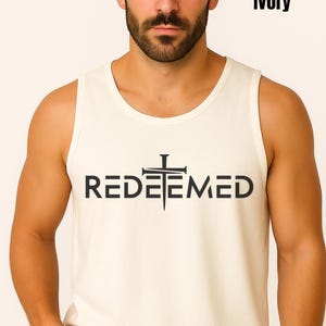 Searching for a meaningful yet stylish gift? Our Comfort Colors tank featuring the bold “Redeemed” design is the perfect choice. This faith-inspired shirt isn’t just another tee—it’s a powerful expression of Christian beliefs and personal testimony. Whether you're shopping for a thoughtful birthday gift, encouragement for a loved one, or simply want to bless someone with a message of redemption, this shirt makes a lasting impression.
