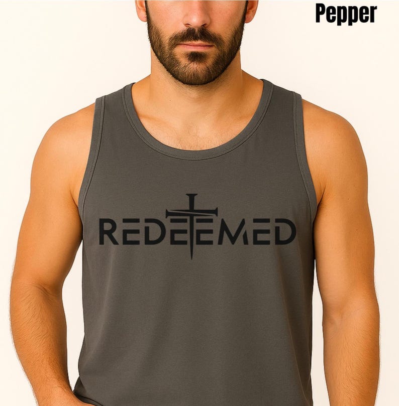 Searching for a meaningful yet stylish gift? Our Comfort Colors tank featuring the bold “Redeemed” design is the perfect choice. This faith-inspired shirt isn’t just another tee—it’s a powerful expression of Christian beliefs and personal testimony. Whether you're shopping for a thoughtful birthday gift, encouragement for a loved one, or simply want to bless someone with a message of redemption, this shirt makes a lasting impression.