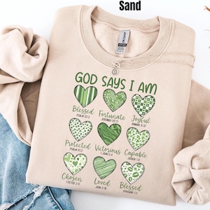This sweatshirt is more than cute—it’s a declaration of faith 💚 The Gildan crewneck fit is soft, cozy, and easy to style, whether you’re heading to church, running errands, or enjoying a relaxed St. Patrick’s Day celebration. Each word reminds you of God’s truth about who you are—something worth carrying with you every day. If you love Christian gifts that are meaningful, wearable, and uplifting, this one belongs in your closet.