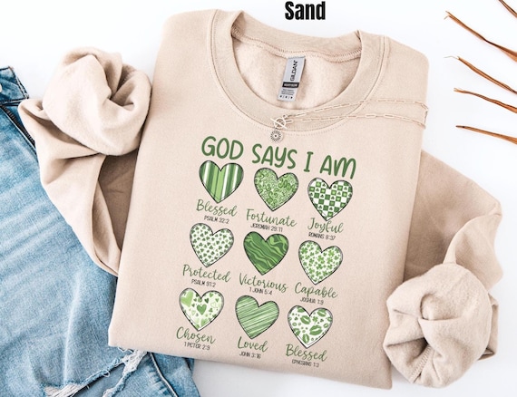 God Says I am Christian Sweatshirt Religious St Patrick's Day Apparel Bible Verse Faith Inspired Hearts Shirt Christian Gift For Women