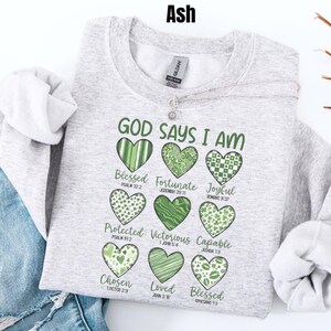 This sweatshirt is more than cute—it’s a declaration of faith 💚 The Gildan crewneck fit is soft, cozy, and easy to style, whether you’re heading to church, running errands, or enjoying a relaxed St. Patrick’s Day celebration. Each word reminds you of God’s truth about who you are—something worth carrying with you every day. If you love Christian gifts that are meaningful, wearable, and uplifting, this one belongs in your closet.