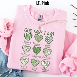 This sweatshirt is more than cute—it’s a declaration of faith 💚 The Gildan crewneck fit is soft, cozy, and easy to style, whether you’re heading to church, running errands, or enjoying a relaxed St. Patrick’s Day celebration. Each word reminds you of God’s truth about who you are—something worth carrying with you every day. If you love Christian gifts that are meaningful, wearable, and uplifting, this one belongs in your closet.