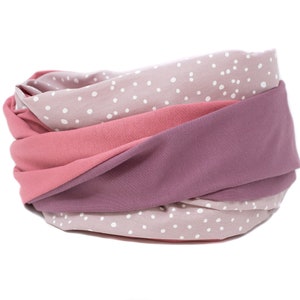 May include: A pink and purple infinity scarf with a white polka dot pattern.