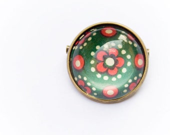 Broche de flores
