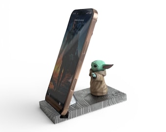 Grogu Phone Stand on Beskar Base | Hand Painted Mandalorian Desk Decor | Baby Yoda Star Wars Gift | Sci-Fi Phone Holder