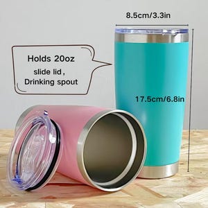 May include: Two insulated tumblers, one teal and one pink, with silver rims and lids. The teal tumbler is upright, measuring 6.8 inches tall and 3.3 inches wide. The pink tumbler is on its side. Both have a slide lid and drinking spout and hold 20 oz.