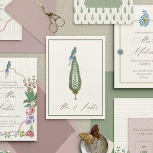 May include: Wedding invitation suite featuring watercolor illustrations. The design includes a central card with a bird perched atop a stylized tree, surrounded by floral and paisley motifs. The color palette is soft, with shades of green, pink, and cream.