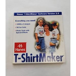 May include: A Hanes T-ShirtMaker Software Version 2.0 box. The cover features a family photo and the text "Everything you need!" with bullet points listing features. The Hanes logo is in a red box, and the product name is in blue.