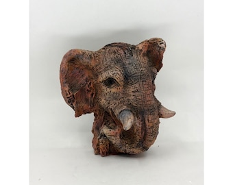 Peso de papel vintage em resina 3D com cabeça de elefante, da Avery Creations, 1996.