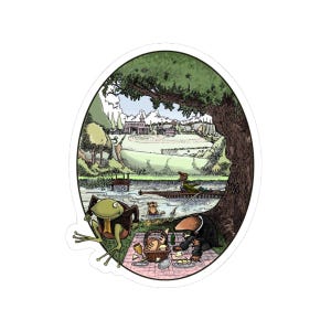 May include: Oval sticker featuring a whimsical illustration of a picnic scene. A frog and a badger are at a picnic, while a mouse rows a boat. The background shows a river, trees, and a distant town. The sticker has a white border.