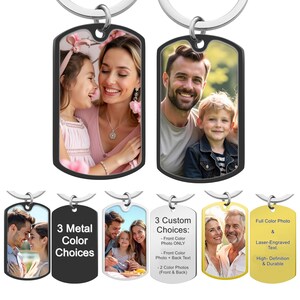 May include: Three silver keychains with black dog tag-shaped charms. Each charm has a different photo printed on it. The charms are available in three metal colors: silver, gold, and black. The text on the charms reads "3 Metal Color Choices", "3 Custom Choices: - Front Color Photo ONLY - Front Color Photo + Back Text - 2 Color Photos (Front & Back)", and "Full Color Photo & Laser-Engraved Text. High-Definition & Durable".