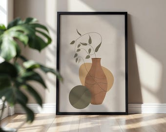 May include: A framed art print with an abstract illustration of a terracotta vase with a plant and abstract shapes in shades of brown and green. The artwork is set against a neutral background and framed in black.