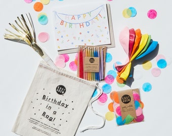 anniversaire dans un sac | Confettis, cartes, ballons, bougies et cor de fête