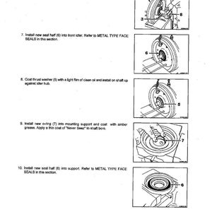May include: Diagram showing undercarriage components with labels and instructions. Text includes "FRONT IDLER" and "UNDERCARRIAGE". Illustrations detail the installation of parts such as mounting supports, seals, and washers. Page number is 14-19.