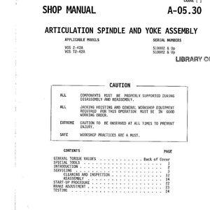 以下が含まれることがあります： Dresser Construction & Mining Equipmentの「Articulation Spindle and Yoke Assembly」というタイトルのショップマニュアル。マニュアルには目次、注意書き、モデルとシリアル番号の情報が含まれています。表紙は白地に黒文字です。