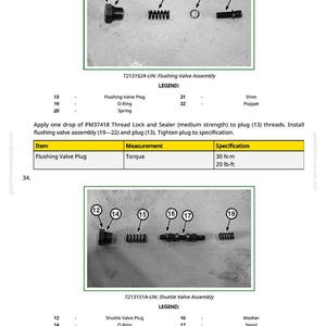 May include: Diagram of flushing valve and shuttle valve assemblies with labels. Includes a flushing valve plug, O-ring, spring, shim, and poppet. The torque specification is 30 N-m or 20 lb-ft. Also shown are shuttle valve components.