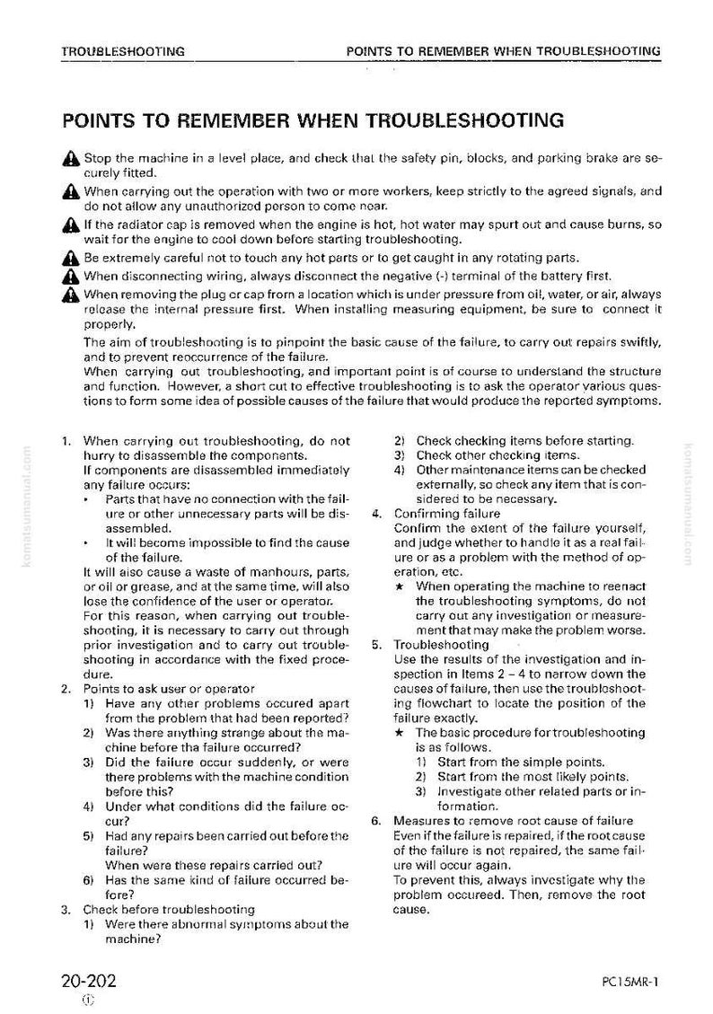 May include: A printed page from a Komatsu manual, titled "Points to Remember When Troubleshooting." The text provides safety guidelines and troubleshooting steps for machinery, including checking safety pins and disconnecting wiring.