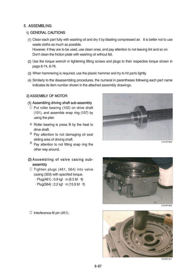 May include: Technical manual page with assembly instructions. Includes images of mechanical components, such as a driving shaft, valve casing, and roller bearing. Text details general cautions and assembly steps for motor components.