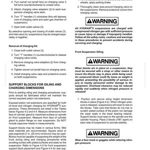May include: A page from a manual detailing front suspension maintenance, including warnings about compressed nitrogen gas and instructions for oiling and charging procedures. Includes diagrams and safety precautions.