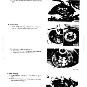 May include: A manual page showing torque converter disassembly and assembly instructions. Diagrams illustrate the fitting of components such as the O-ring, stator shaft, and gear bearings. Text includes measurements in mm.