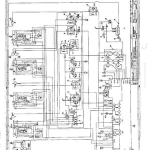 May include: A detailed technical diagram with the text "MANNESMANN DEMAG" and "Hydraulikplan". The diagram features numerous interconnected components, lines, and symbols, with labels and numbers throughout. The overall color scheme is black and white.