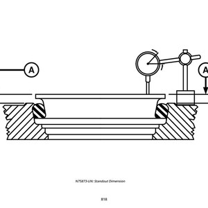 May include: Black and white technical drawing of a mechanical component with a dial indicator measuring a dimension. The drawing includes cross-sections and labels, illustrating the measurement setup.