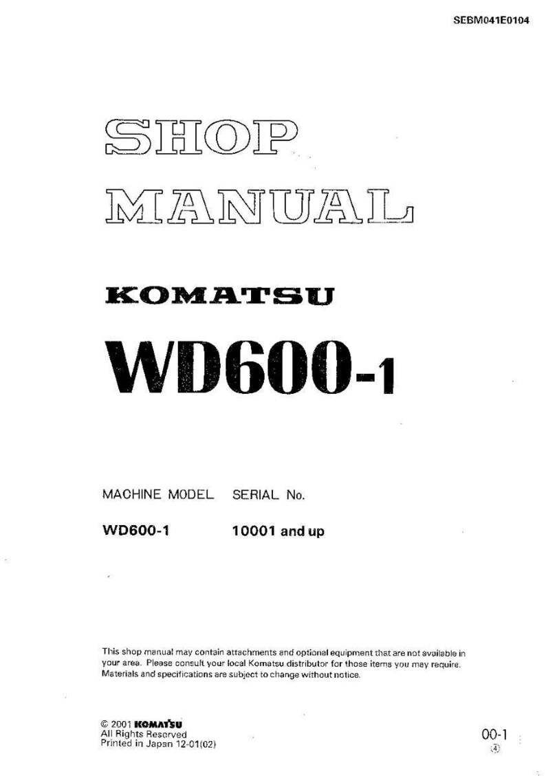 May include: A white shop manual with the text "SHOP MANUAL" at the top. Below is the brand name "KOMATSU" and the model "WD600-1". The manual also lists the machine model and serial number.