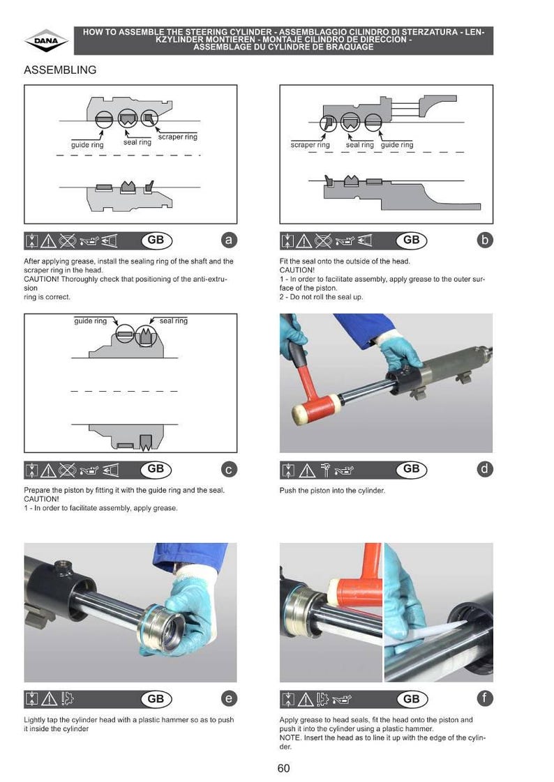 May include: Illustrated instructions for assembling a steering cylinder. The diagrams show the steps, including applying grease, installing rings, and inserting the piston. Text in English and other languages.
