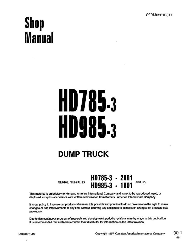 May include: A white shop manual with the text "Shop Manual" at the top. The manual includes the model numbers HD785-3 and HD985-3, and the words "DUMP TRUCK". The serial numbers HD785-3 - 2001 and up, and HD985-3 - 1001 are also listed.