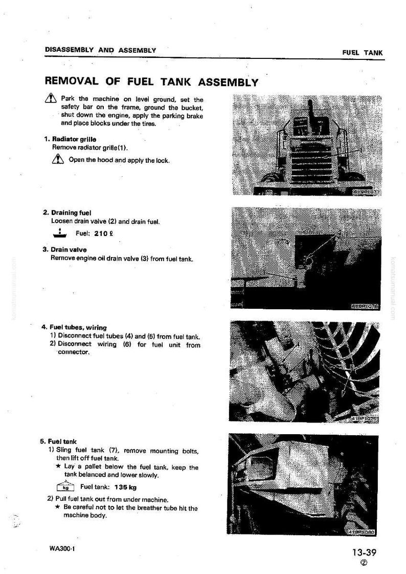 May include: A page from a manual detailing the removal of a fuel tank assembly. The text includes instructions for draining fuel, disconnecting fuel tubes, and removing the tank. The fuel tank weighs 135 kg.