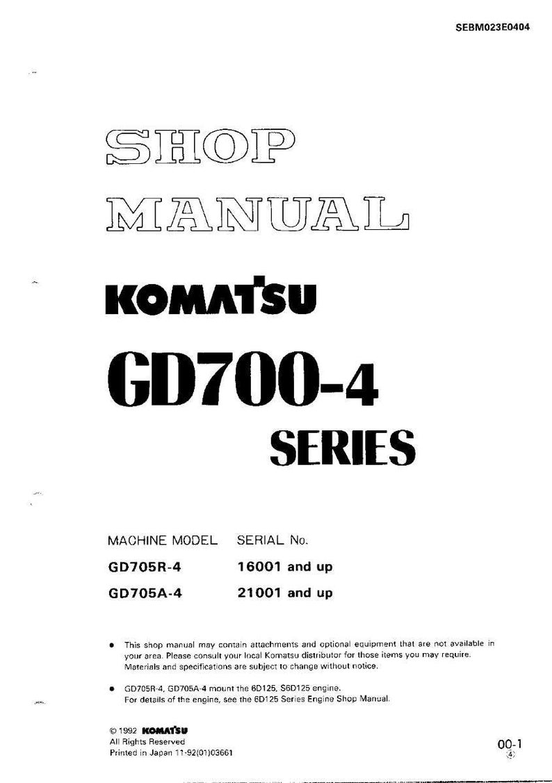 May include: A white shop manual with the text "SHOP MANUAL" and "KOMATSU GD700-4 SERIES". The manual includes machine model and serial number information. The document is printed in Japan.