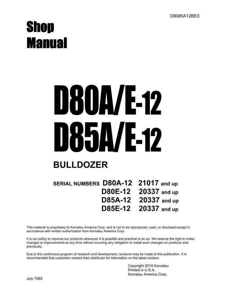 May include: A white shop manual cover with black text. The title "Shop Manual" is at the top, followed by "D80A/E-12" and "D85A/E-12". The word "BULLDOZER" is below the model numbers. Serial numbers are listed.