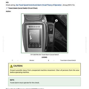 May include: A grayscale image of a control panel with a monitor and a travel alarm cancel switch. The panel has a screen and several buttons. Text includes a caution about machine movement and instructions for a travel alarm check.