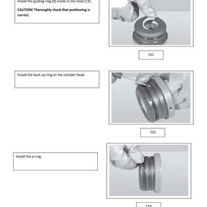 May include: A page from a service manual with instructions for installing parts. The text includes "Install the guiding ring," "Install the back-up ring," and "Install the o-ring." The images show hands wearing gloves working on mechanical components.
