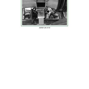 May include: Black and white image of a front extend coupler, labeled "X11E - Front Extend Coupler (Raise)". The image includes the text "A87001-UN: X11E". The coupler appears to be part of a larger agricultural machine.