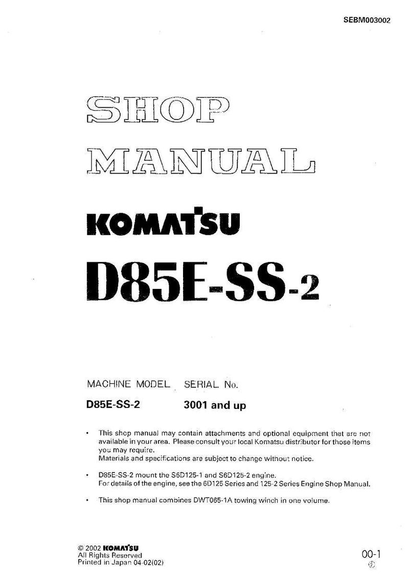 May include: A white shop manual for a Komatsu D85E-SS-2 machine. The cover features the title "SHOP MANUAL" in a bold, outlined font, along with the Komatsu logo and model information. The manual includes technical specifications.