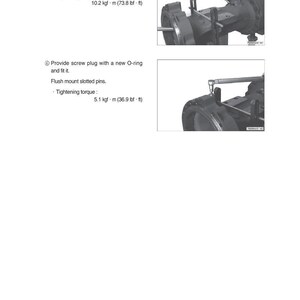 Puede incluir: Diagrama de componentes mec&aacute;nicos con instrucciones de texto. El texto dice: Montar el tubo de freno con conexi&oacute;n roscada y tuerca hexagonal. Par de apriete: 10,2 kgf&middot;m (100,0 Nm). Proporcionar el tap&oacute;n roscado con una nueva junta t&oacute;rica. Par de apriete: 5,1 kgf&middot;m (50,0 Nm).