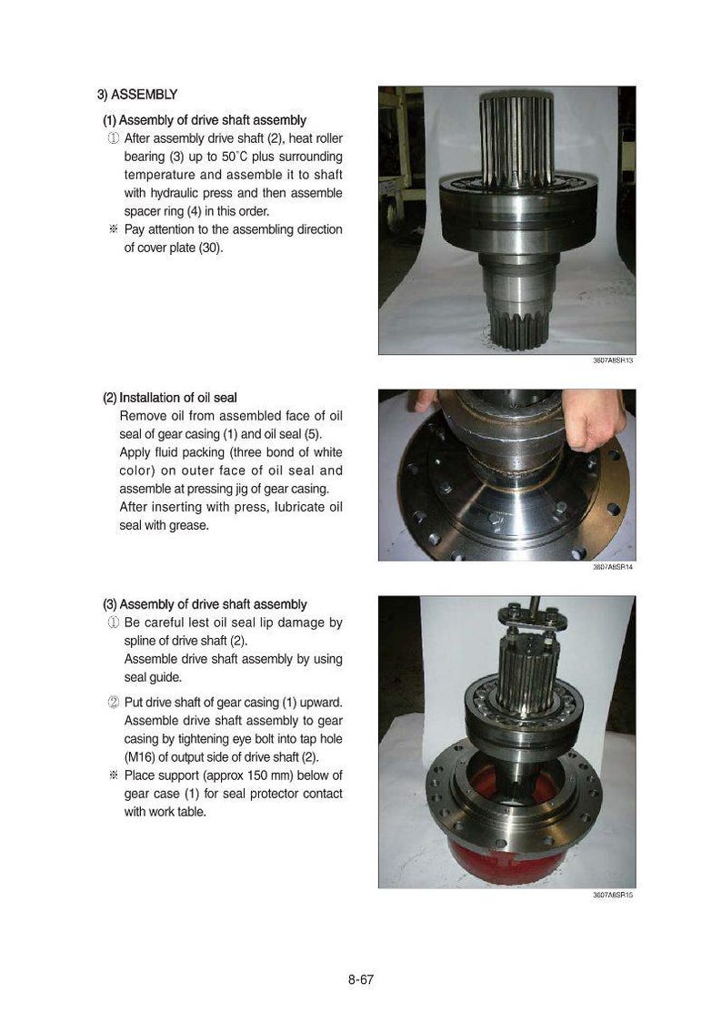 May include: Images detailing the assembly of a drive shaft and oil seal installation. The components are metallic, showcasing mechanical engineering and automotive parts.